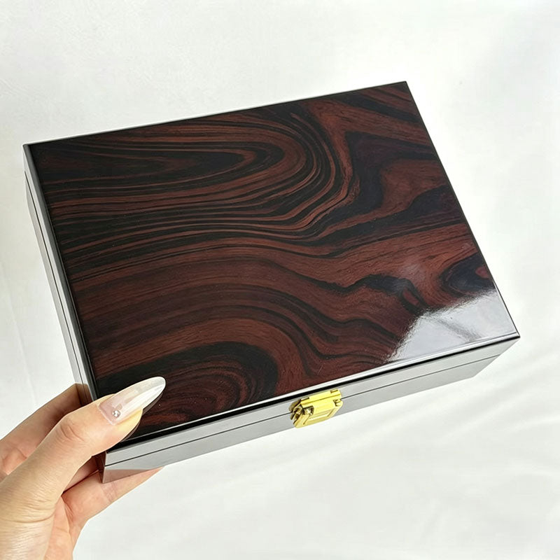 Rectangular dark wooden jewelry box with lock