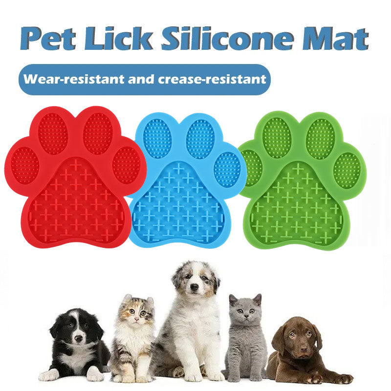 Paw-shaped silicone pet lick mats in red, blue and green