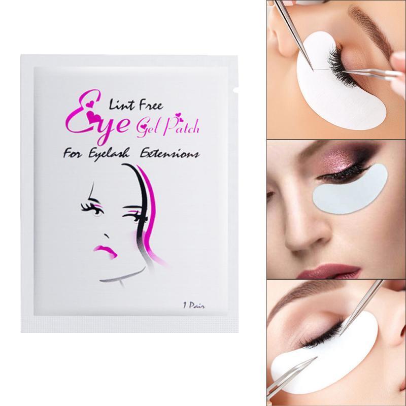 Under-eye pads shown during eyelash extension application