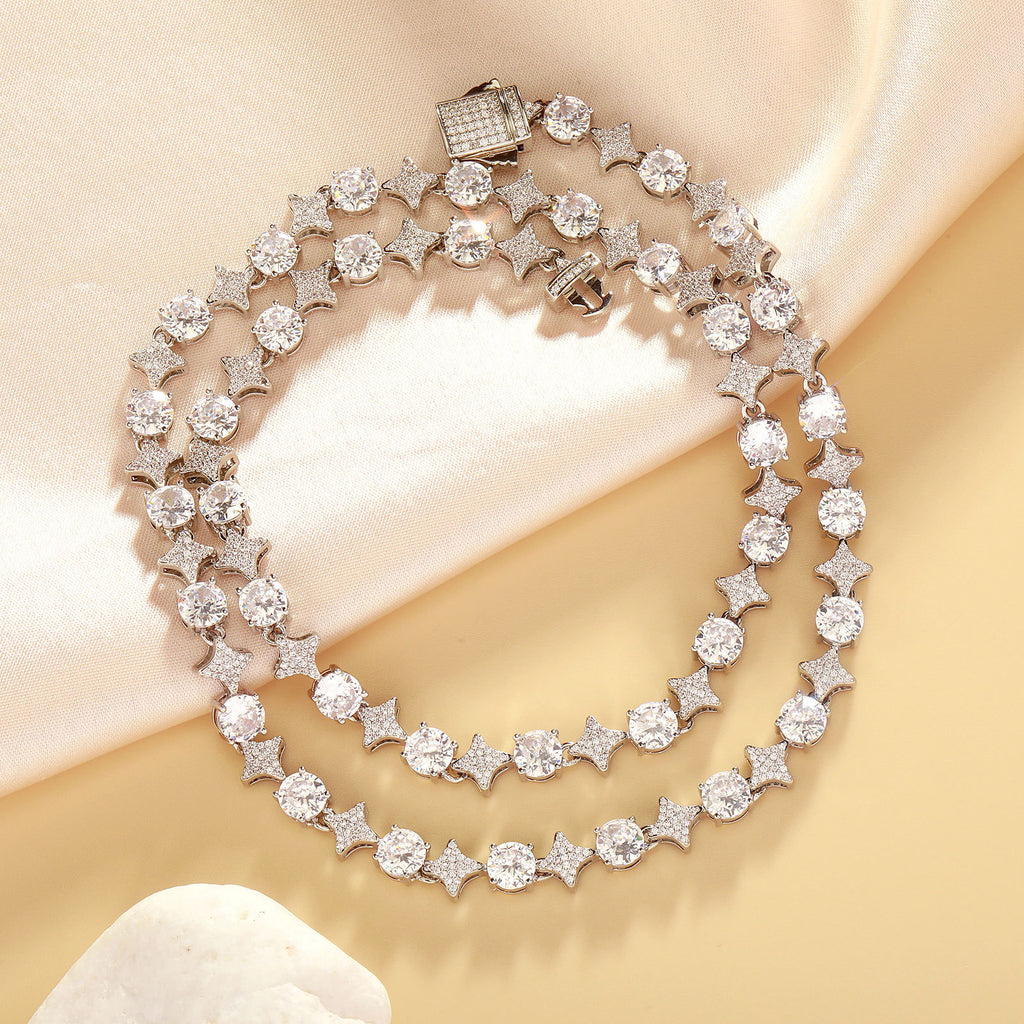 Layered necklaces with pale stones and star motifs