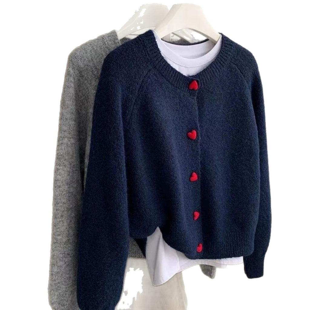 Navy cropped cardigan with red heart-shaped buttons