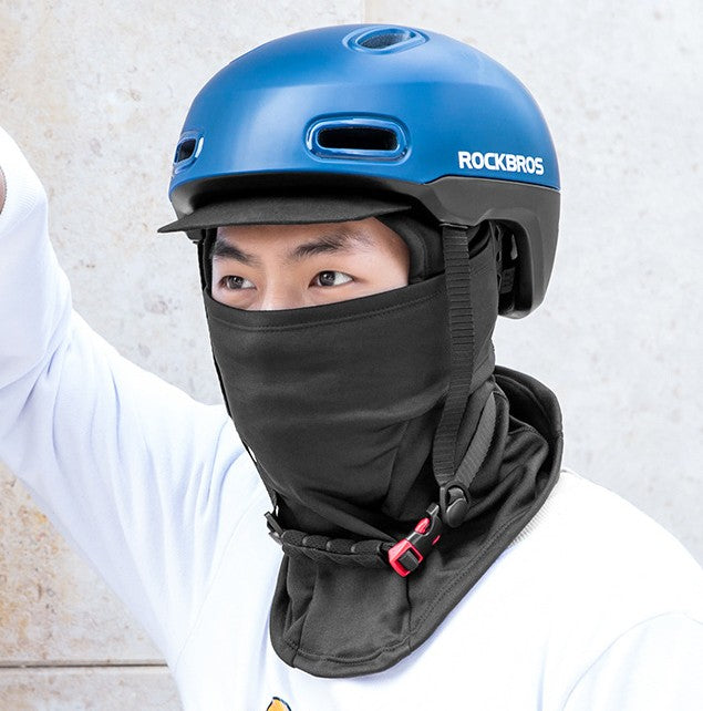 Cyclist wearing black winter face and neck cover