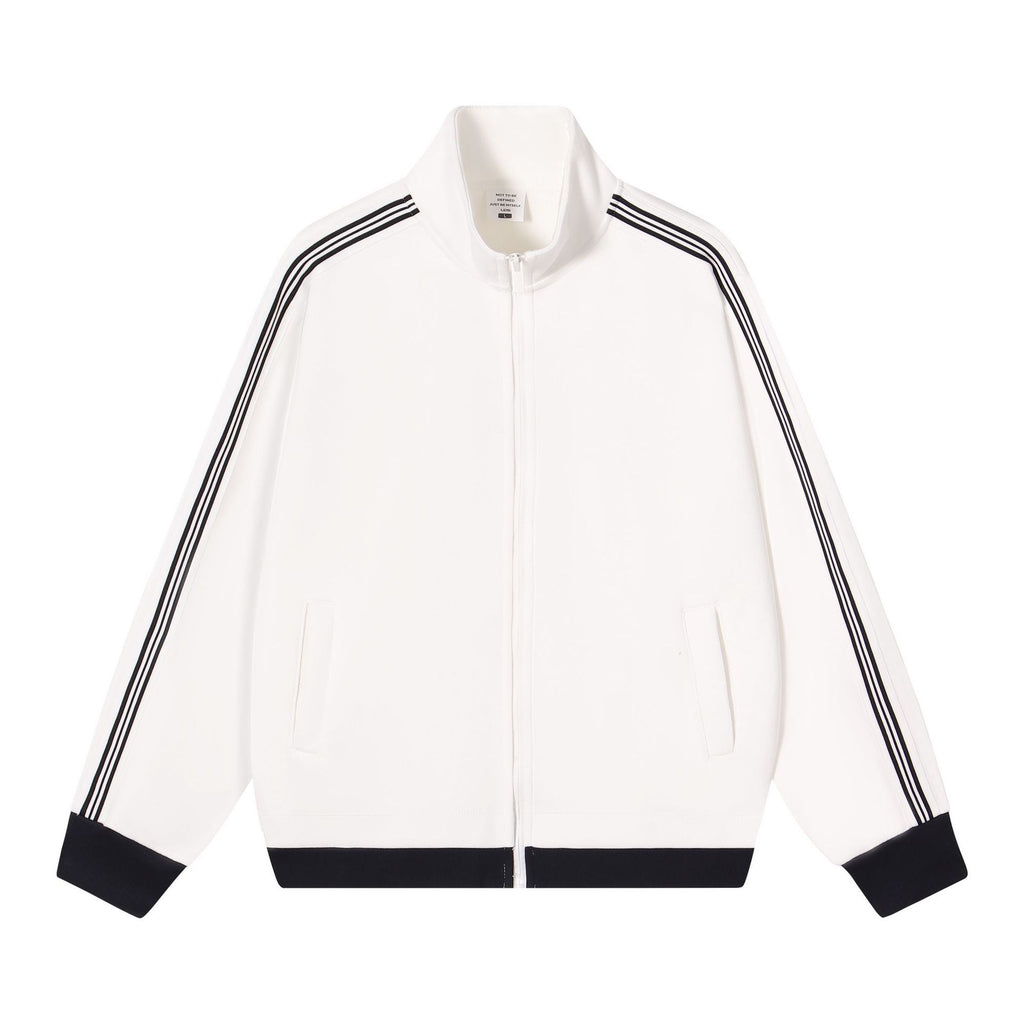 White track-style zip jacket with dark stripes