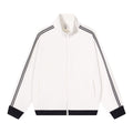 White track-style zip jacket with dark stripes