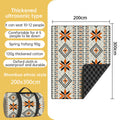 Patterned picnic blanket showing dimensions and folded form