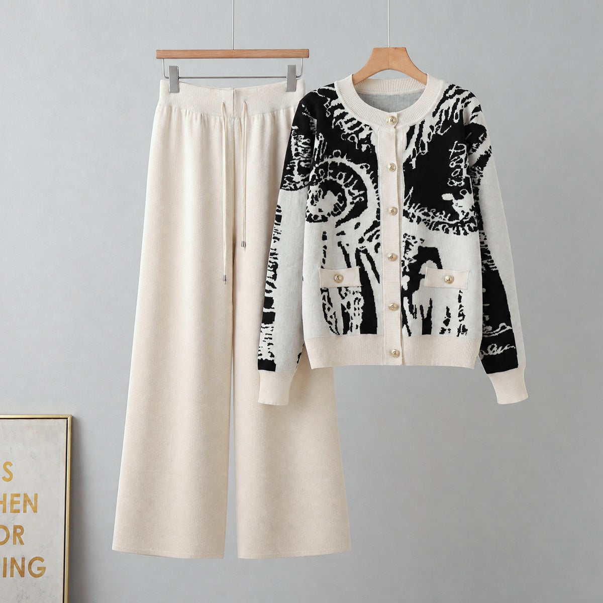 Black-and-white patterned cardigan and matching trousers
