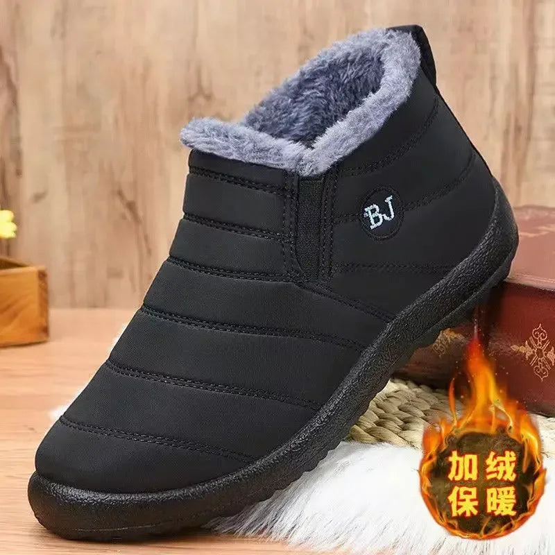 Black slip-on ankle boot with gray plush lining