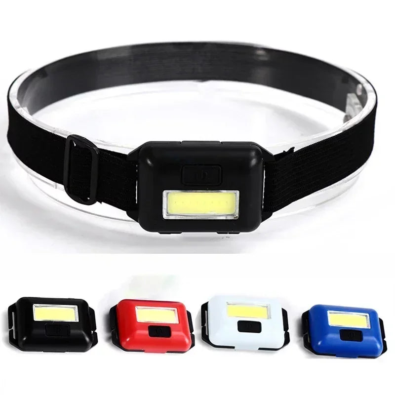 LED camping headlamp shown in black, red, white and blue